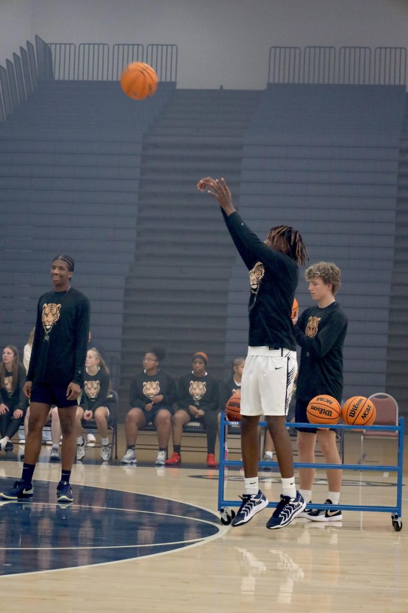 Britain Jones taking his turn shooting 3's.