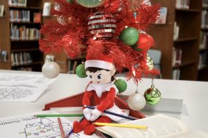 The AHS Library's Elf on the Shelf.