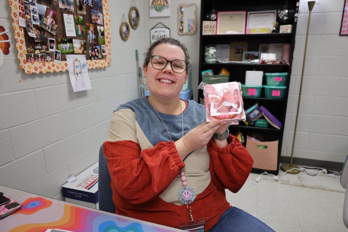 Students send back love to their teacher by giving them little treats.